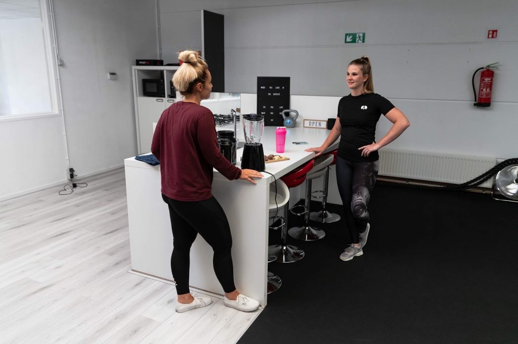 coaching gesprek met client na een personal training sessie